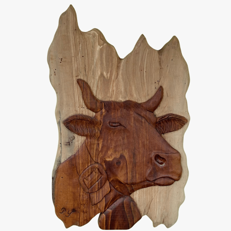 Sculpture sur bois en forme de vache